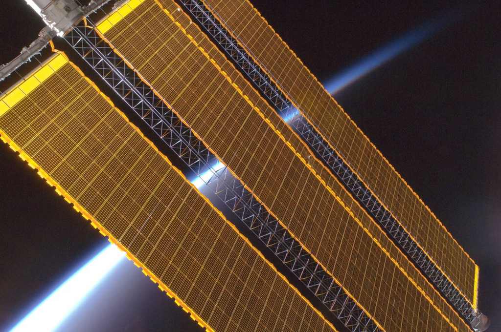 The solar arrays of the International Space Station. Image Source: NASA via Wikimedia commons. Public Domain.